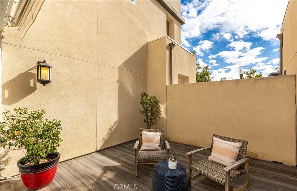 245 Follyhatch Irvine, CA 92618 - Photo 33 of 44 a view of a chairs and table in the patio