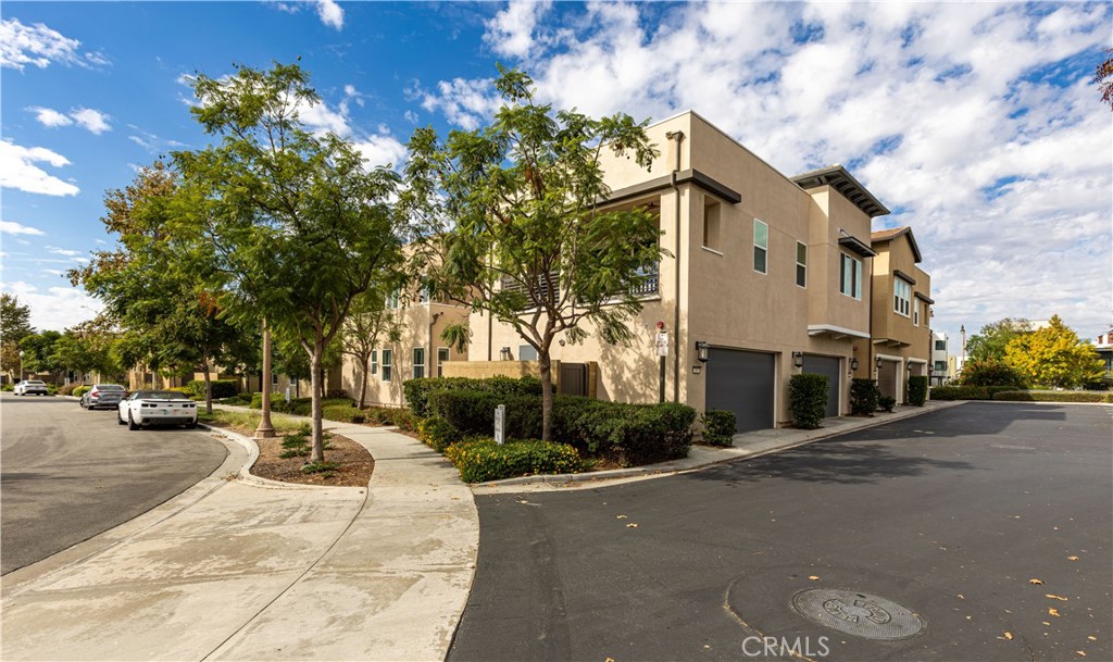 245 Follyhatch Irvine, CA 92618 - Photo 36 of 44 a view of a street with houses on both side