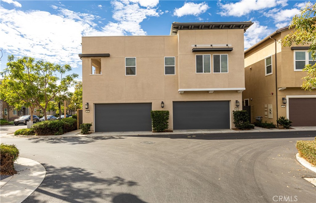245 Follyhatch Irvine, CA 92618 - Photo 40 of 44 a front view of a house with yard