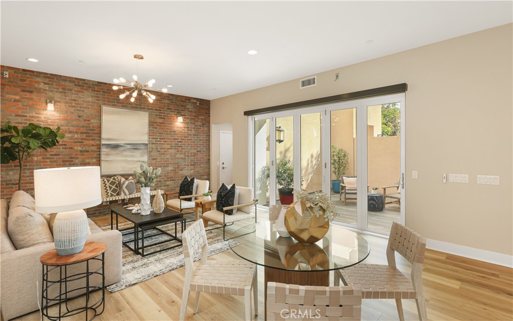 245 Follyhatch Irvine, CA 92618 - Photo 6 of 44 a living room with furniture and a large window