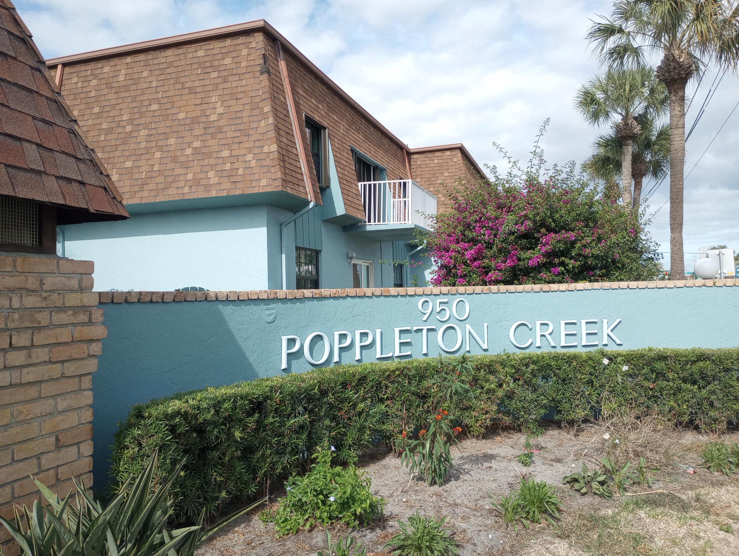 950 South Kanner Highway, Unit A21 Stuart, FL 34994 - Photo 1 of 24 a sign on the side of a building