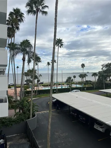 a bedroom with furniture and window