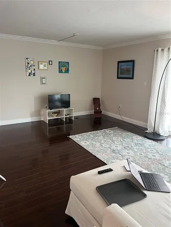 a kitchen with a sink and a stove top oven