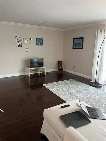 a kitchen with a sink and a stove top oven