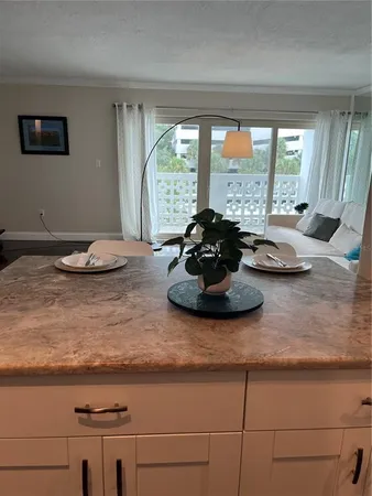 a room with a bed and a large window