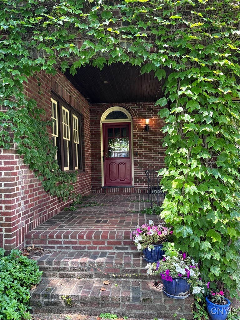 13 Brattle Road Syracuse, NY 13203 - Photo 3 of 48 English Ivy Arch Entrance to the Brick Portico