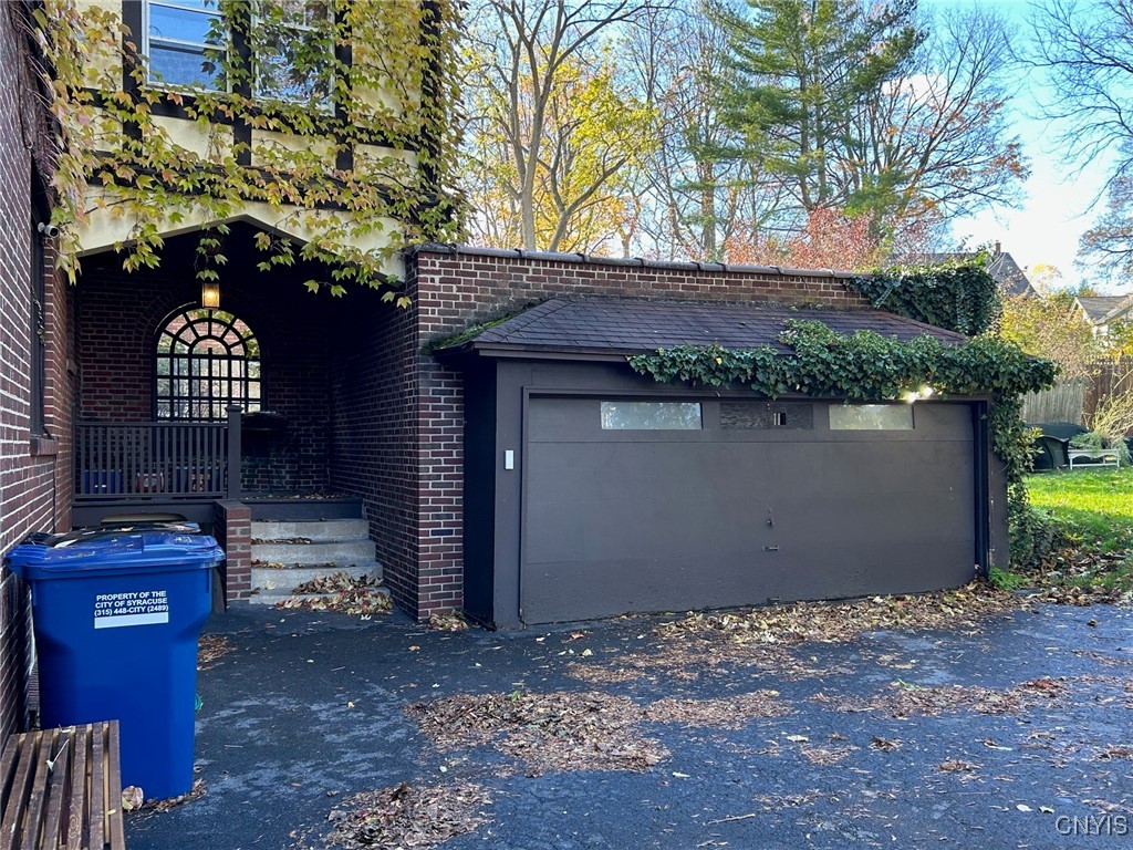 13 Brattle Road Syracuse, NY 13203 - Photo 43 of 48 13 Brattle Rd -Back Porch and 2 car garage.