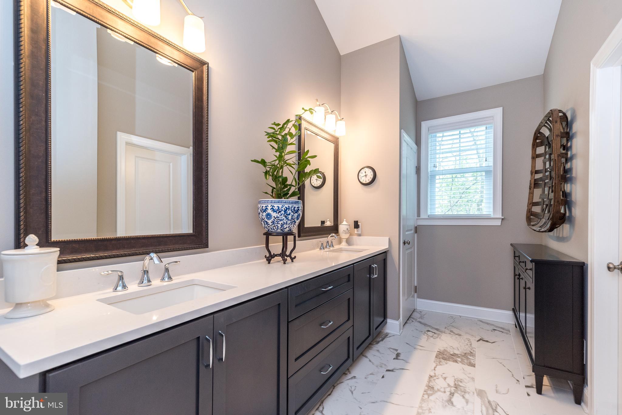 1 White Field Lower Gwynedd, PA 19002 - Photo 30 of 53 a bathroom with a sink and a mirror