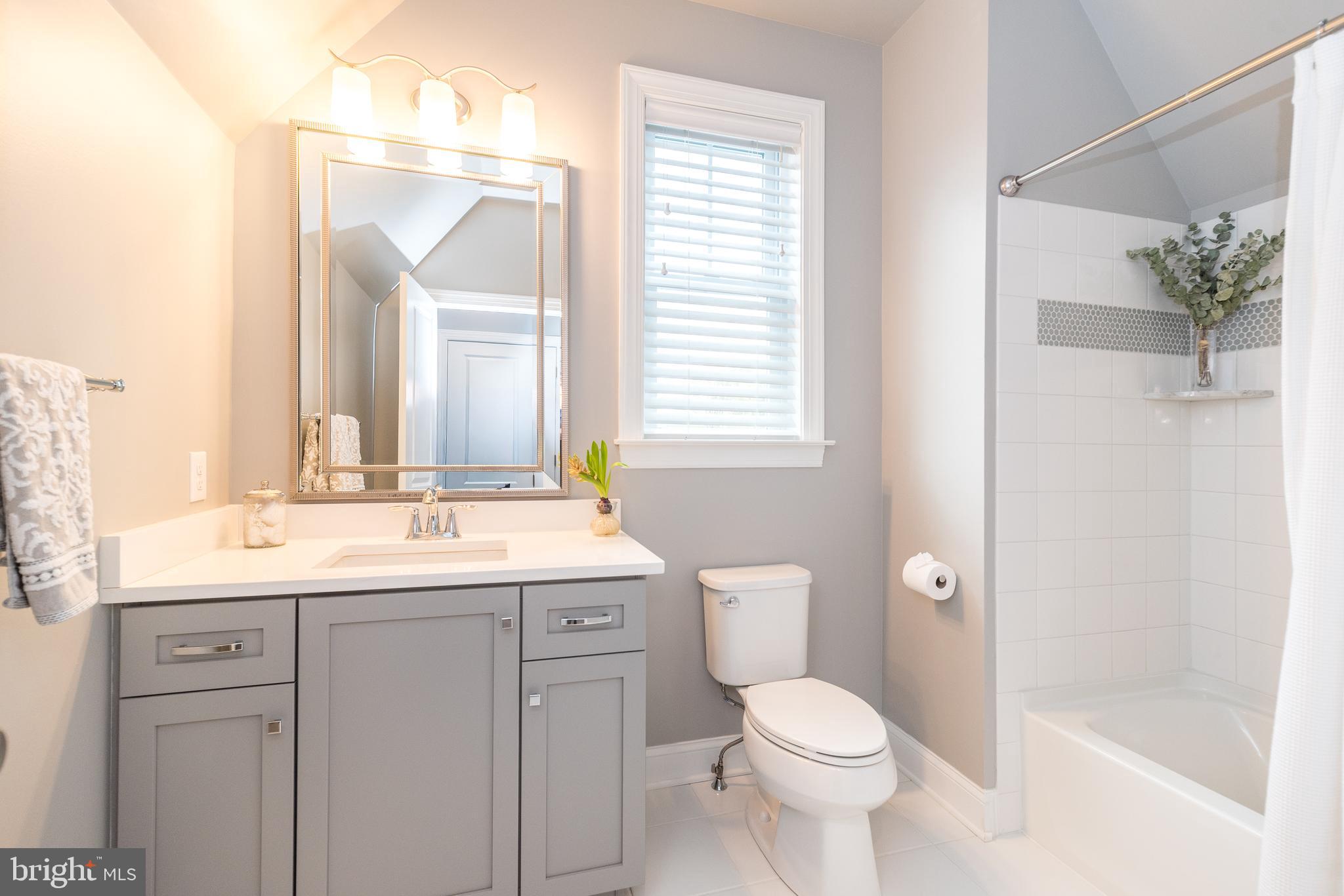 1 White Field Lower Gwynedd, PA 19002 - Photo 37 of 53 a bathroom with a toilet sink and mirror
