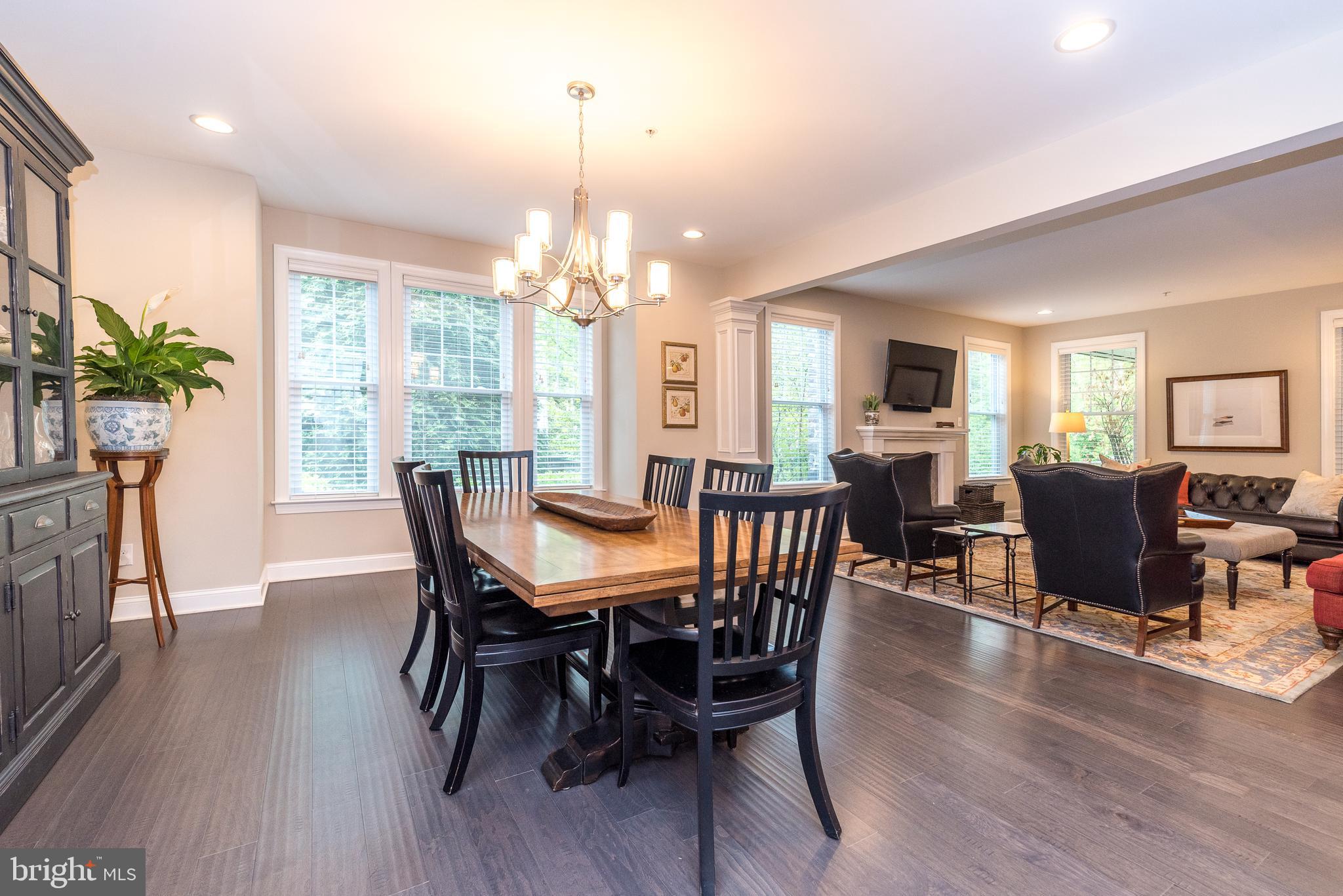 1 White Field Lower Gwynedd, PA 19002 - Photo 6 of 53 a view of a dining room with furniture window and wooden floor