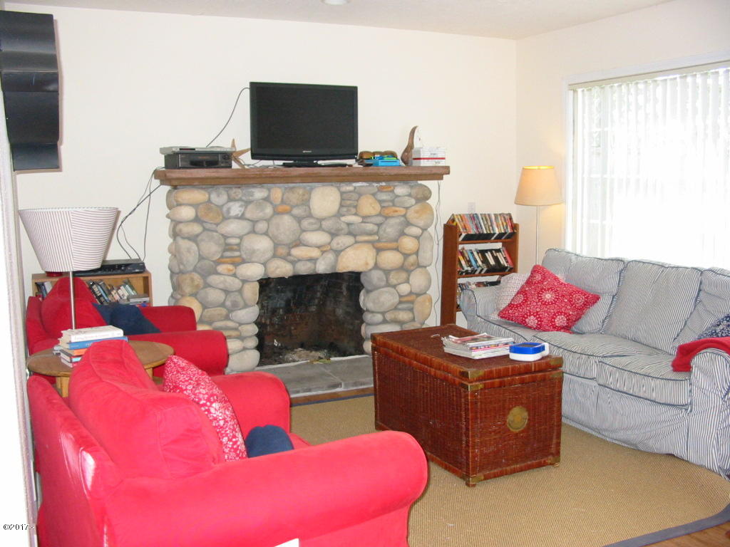 47840 Hawk Street Neskowin, OR 97149 - Photo 6 of 20 Cozy Living Rm with River Rock Fireplace
