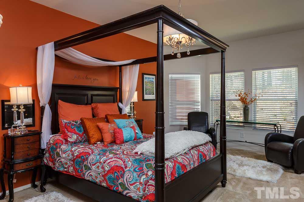 131 Daneborg Road Durham, NC 27703 - Photo 11 of 25 Tucked behind the gorgeous built ins of the great room, you'll love this retreat with room for a reading nook surrounded by windows.