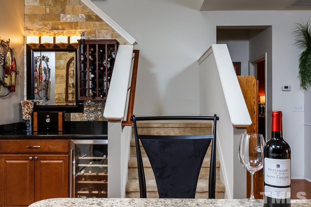 131 Daneborg Road Durham, NC 27703 - Photo 15 of 25 Featured in the main living area with yet more custom stone, granite, and a wine cooler, this bar area brings an elegance you won't find in comparable homes at this price!