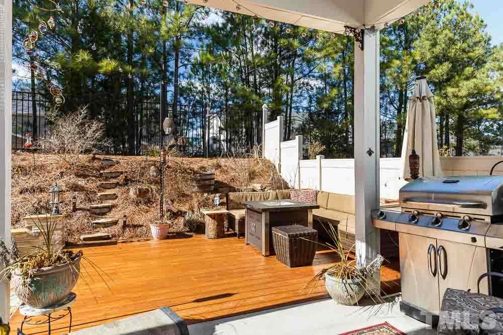 131 Daneborg Road Durham, NC 27703 - Photo 23 of 25 Saved the best for last! Step onto the covered patio to enter your personal nature retreat!