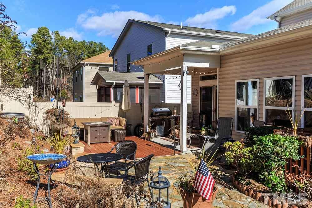 131 Daneborg Road Durham, NC 27703 - Photo 25 of 25 Fully landscaped with perennials that will surprise and delight you come spring. Dine al fresco on your stone patio among the flowers and birds with plenty of privacy provided by your new fence!