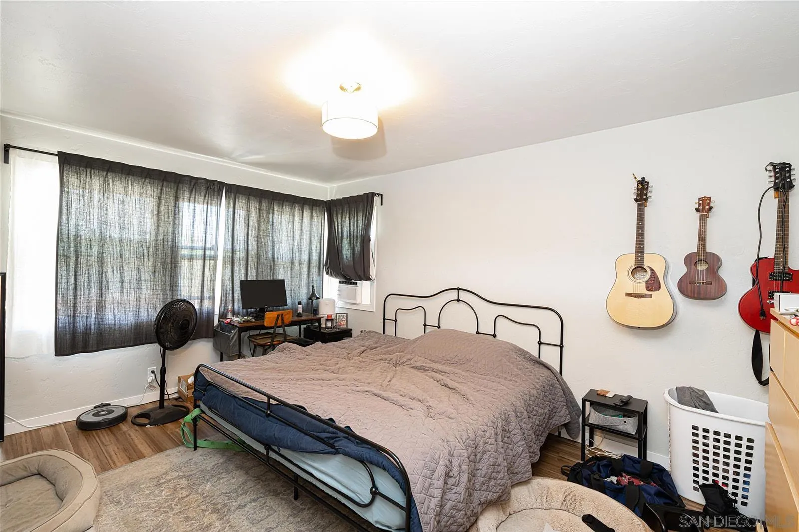 5451 Redding Road San Diego, CA 92115 - Photo 17 of 37 a bedroom with two beds and a dresser
