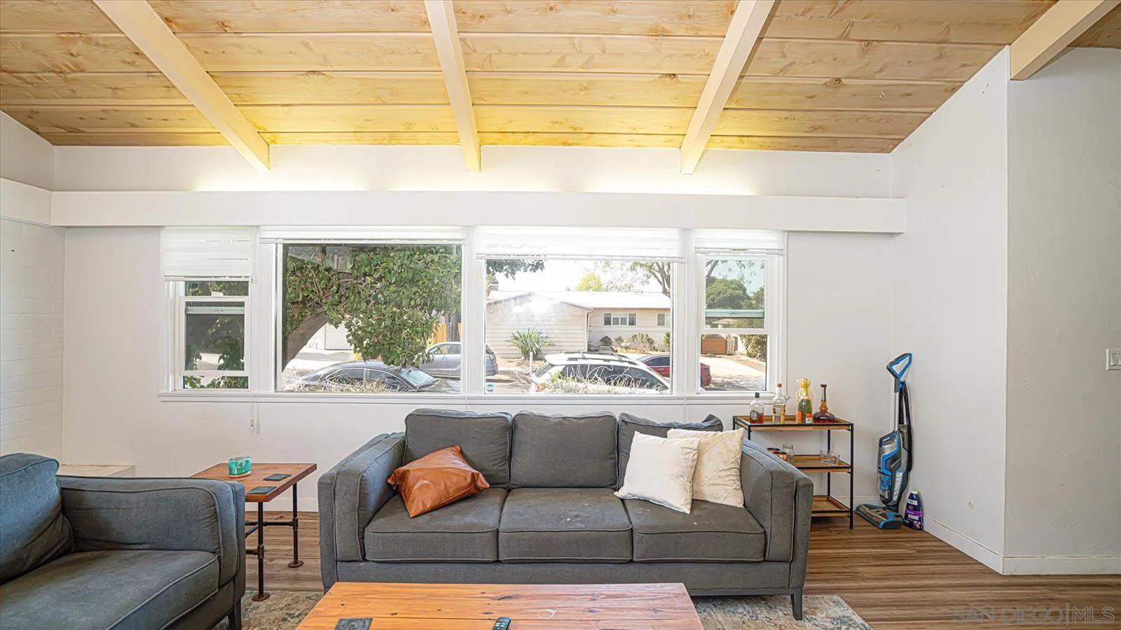5451 Redding Road San Diego, CA 92115 - Photo 3 of 37 a living room with furniture and a table