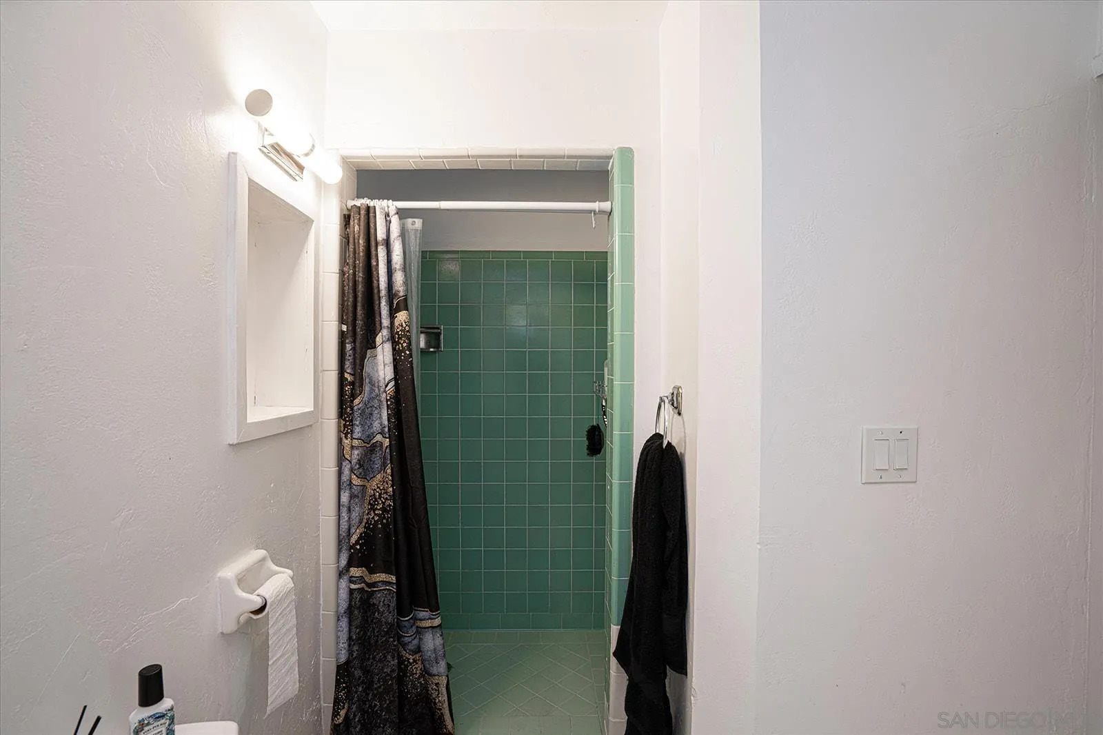 5451 Redding Road San Diego, CA 92115 - Photo 31 of 37 a bathroom with a shower