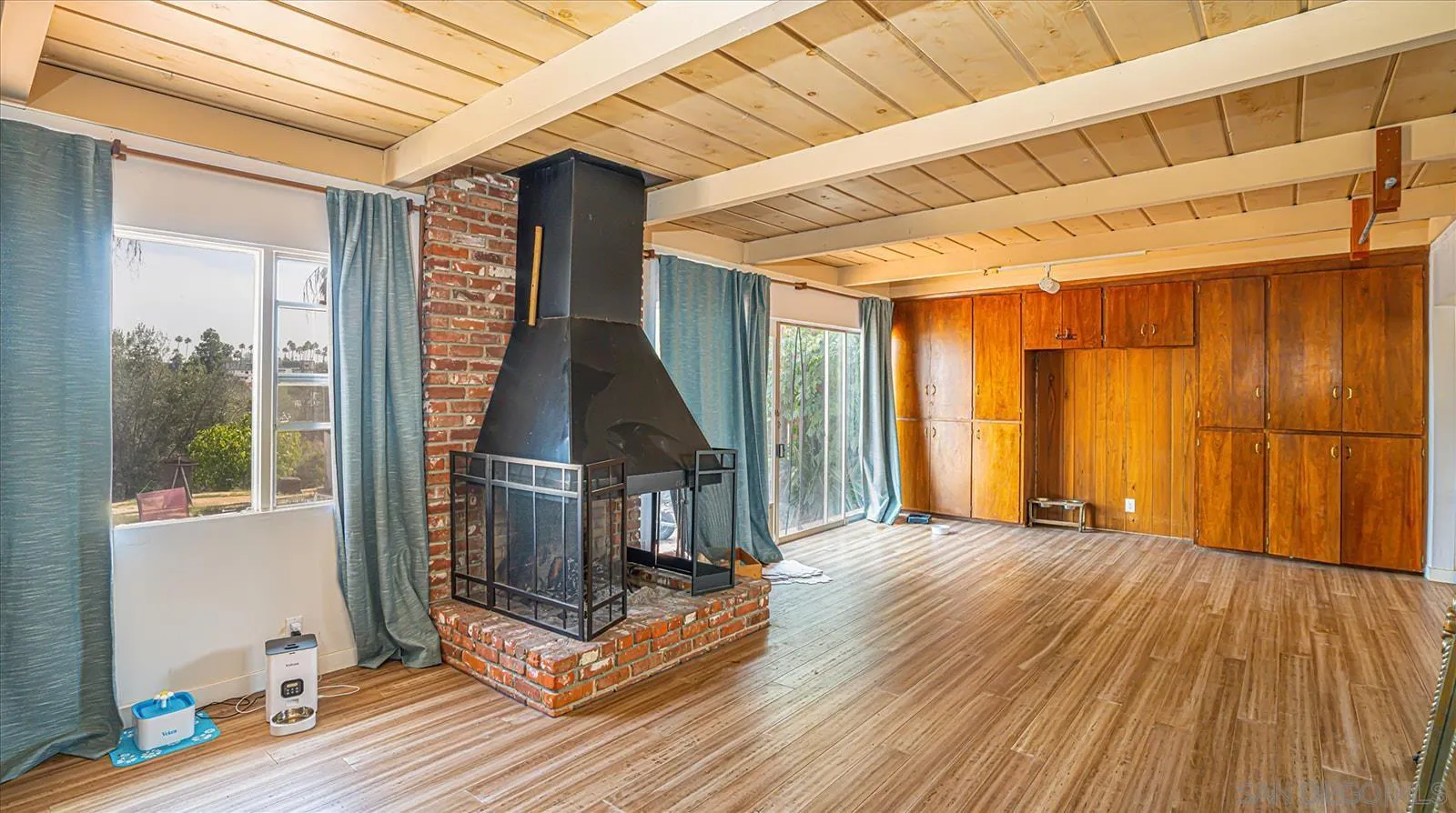 5451 Redding Road San Diego, CA 92115 - Photo 9 of 37 a view of an entryway with wooden floor and door