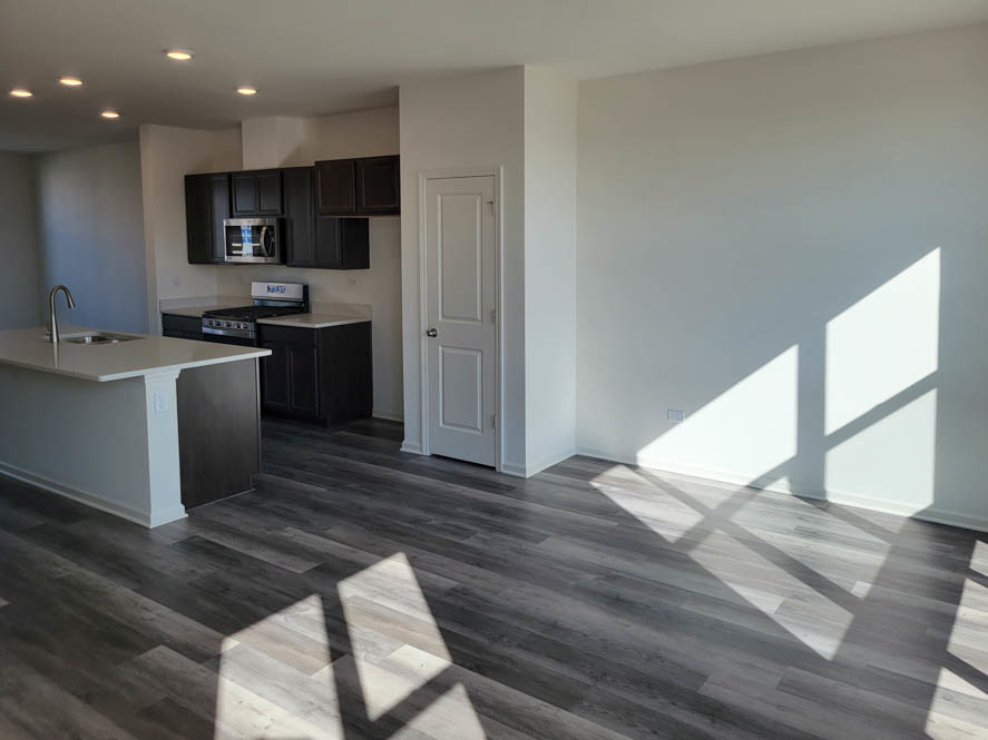 358 Summit Circle Lombard, IL 60148 - Photo 18 of 55 a kitchen with stainless steel appliances granite countertop a stove a sink and a refrigerator