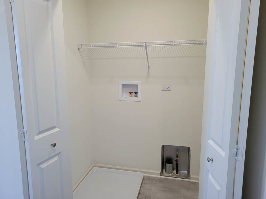 358 Summit Circle Lombard, IL 60148 - Photo 26 of 55 a view of a room with racks on the wall