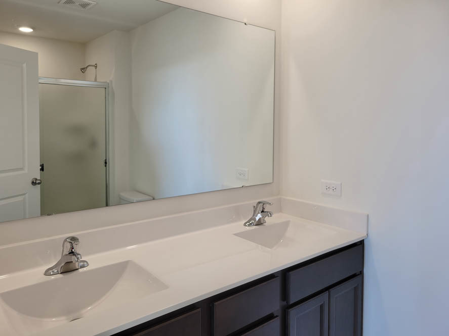 358 Summit Circle Lombard, IL 60148 - Photo 32 of 55 a bathroom with a sink and a mirror