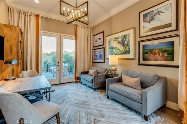 a bedroom with a bed and a lamp