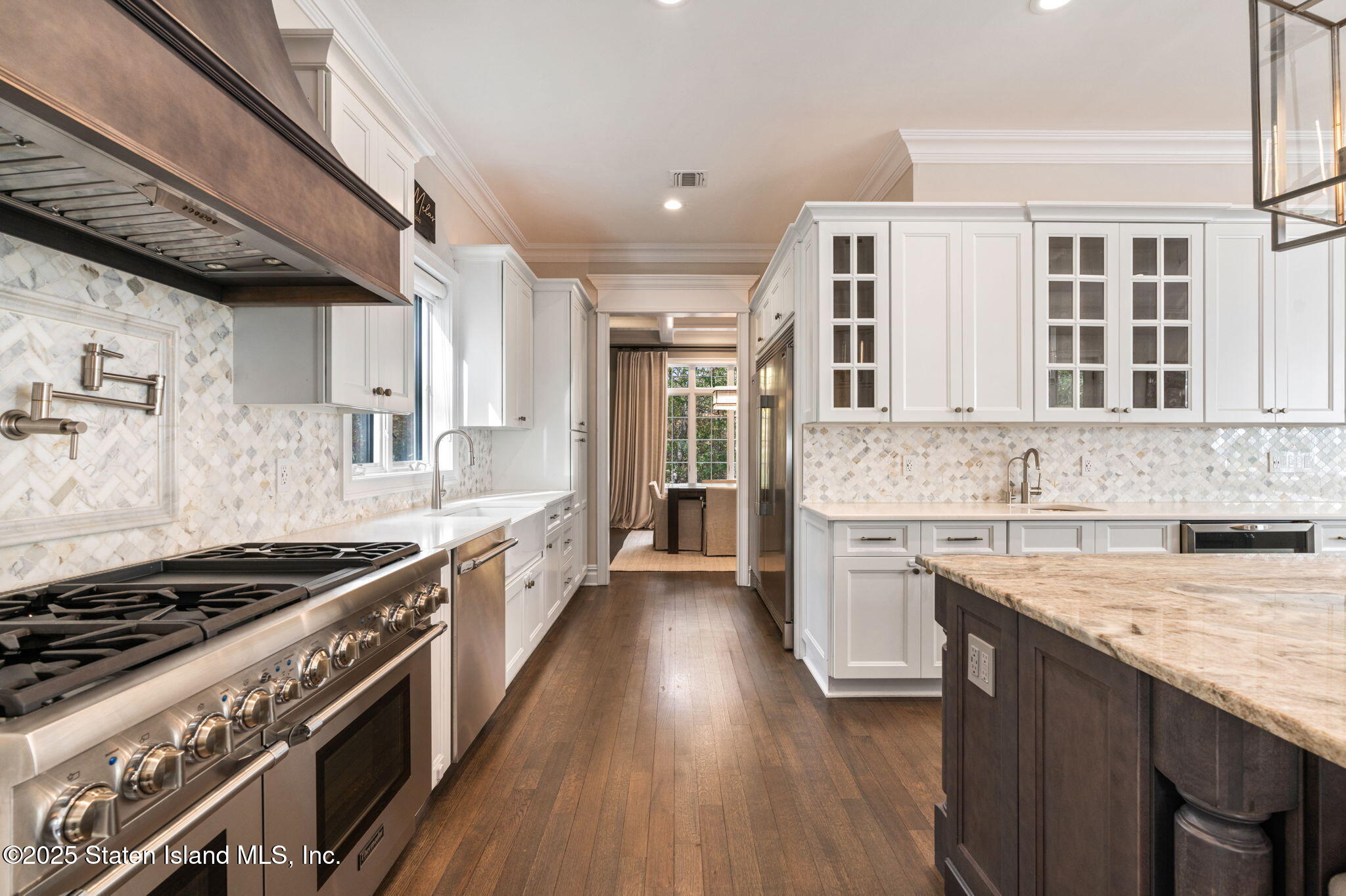 312 London Road Staten Island, NY 10306 - Photo 23 of 82 a large kitchen with stainless steel appliances granite countertop a stove and a sink