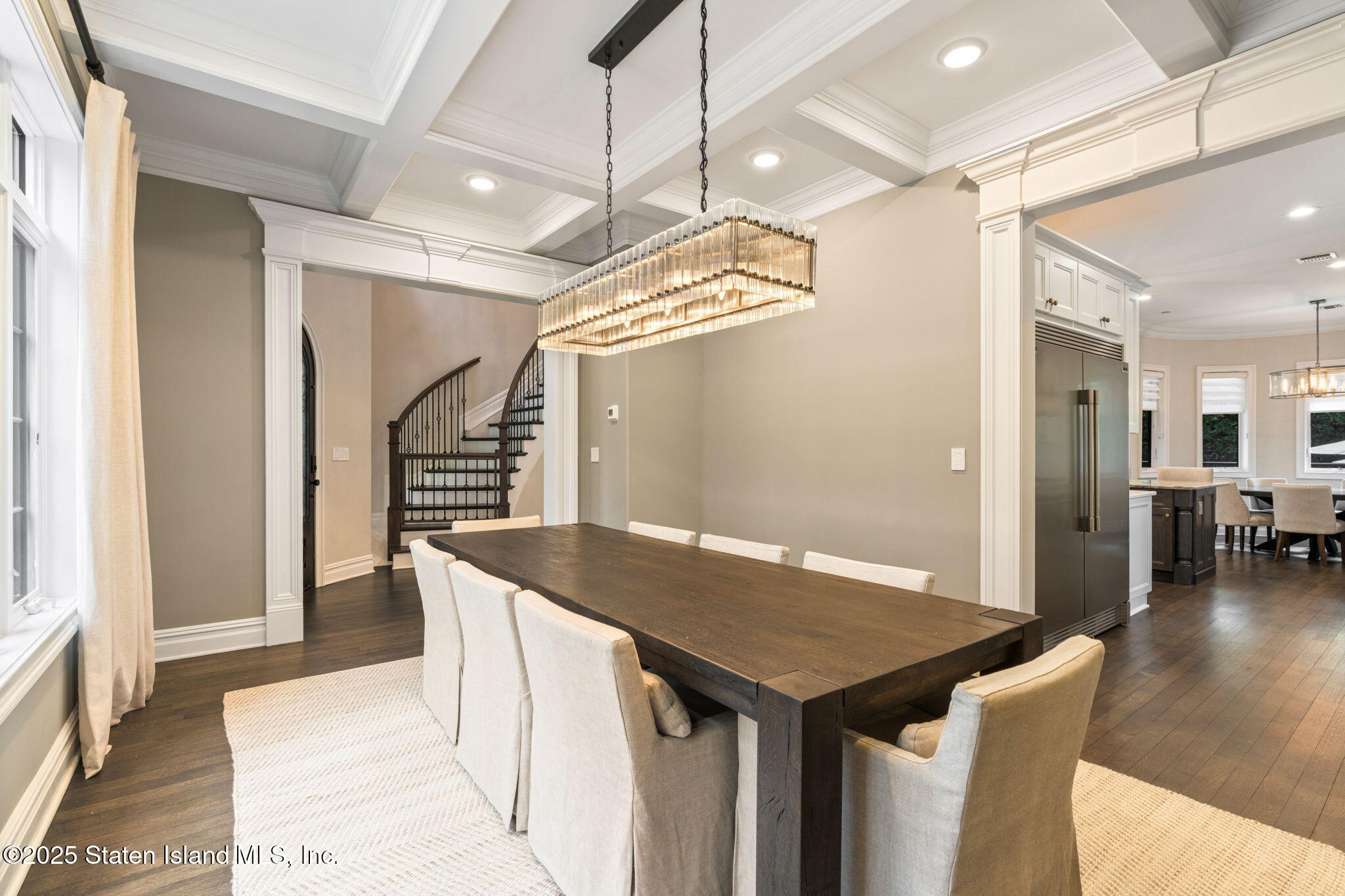 312 London Road Staten Island, NY 10306 - Photo 25 of 82 a kitchen that has a table and chairs in it