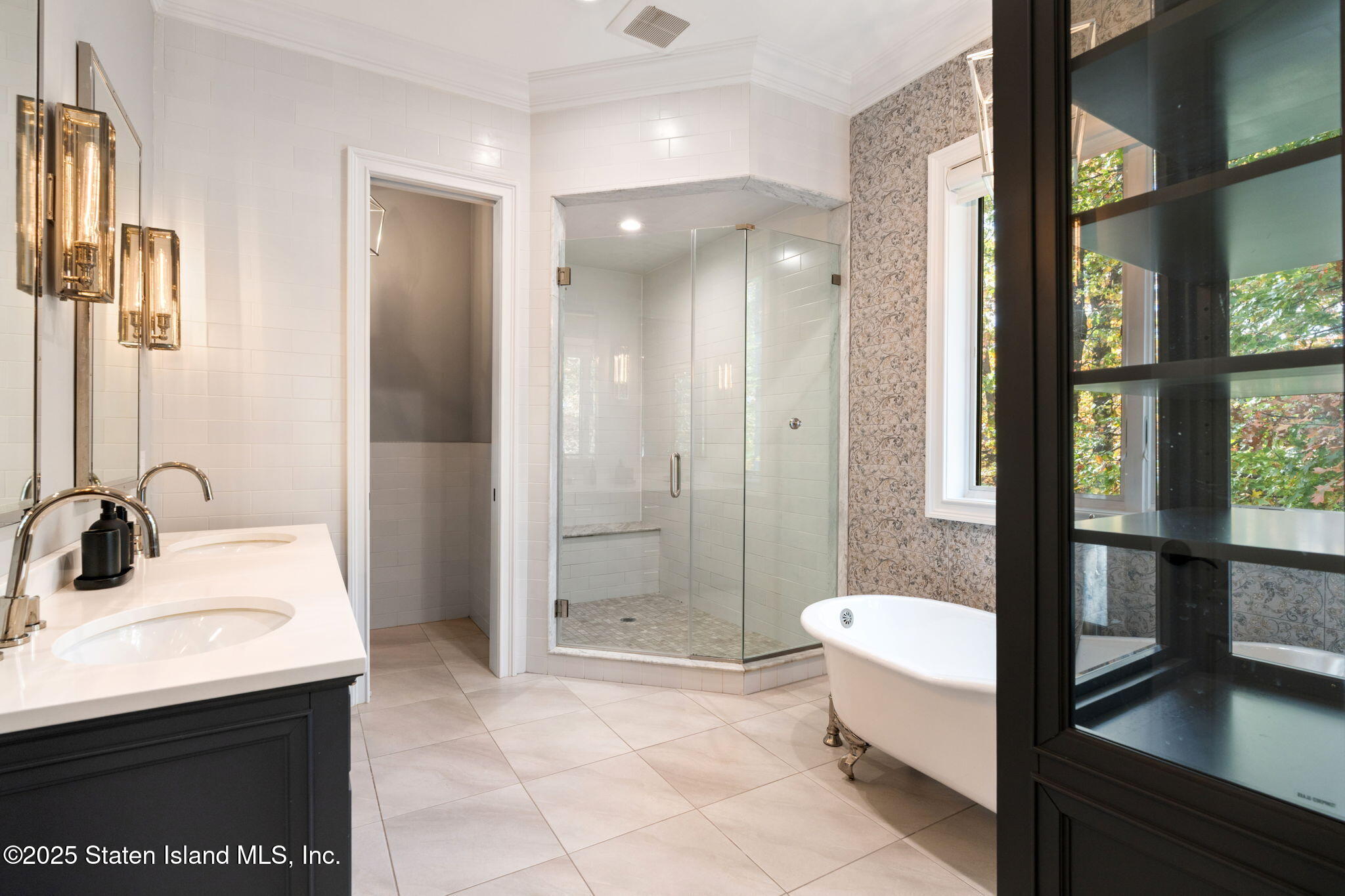 312 London Road Staten Island, NY 10306 - Photo 40 of 82 a bathroom with a sink a toilet and shower