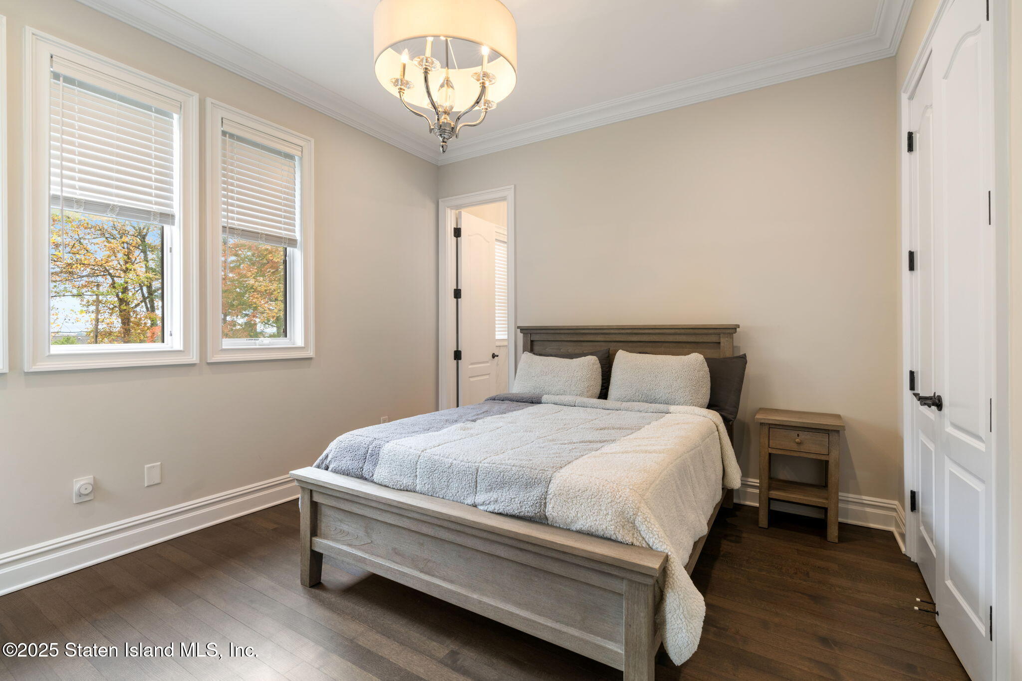 312 London Road Staten Island, NY 10306 - Photo 45 of 82 a bedroom with a bed and a window