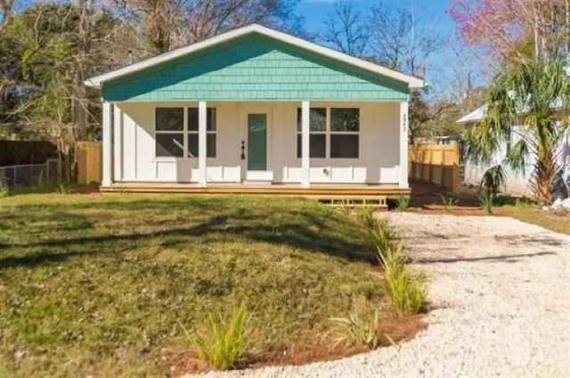 a view of a house with a swimming pool