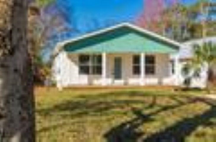 2943 North 6th Street St. Augustine, FL 32084 - Photo 2 of 17 a view of a house with a yard