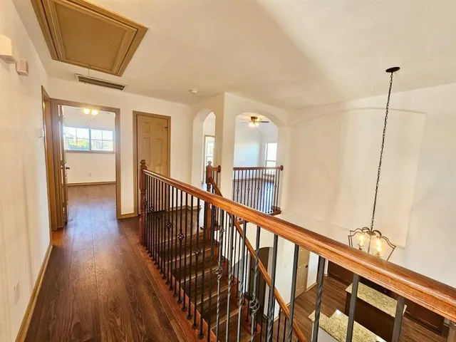 a view of entryway with wooden floor