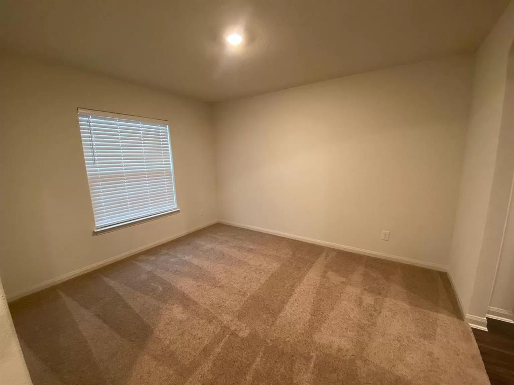 213 Allington Circle Jarrell, TX 76537 - Photo 11 of 16 an empty room with a window