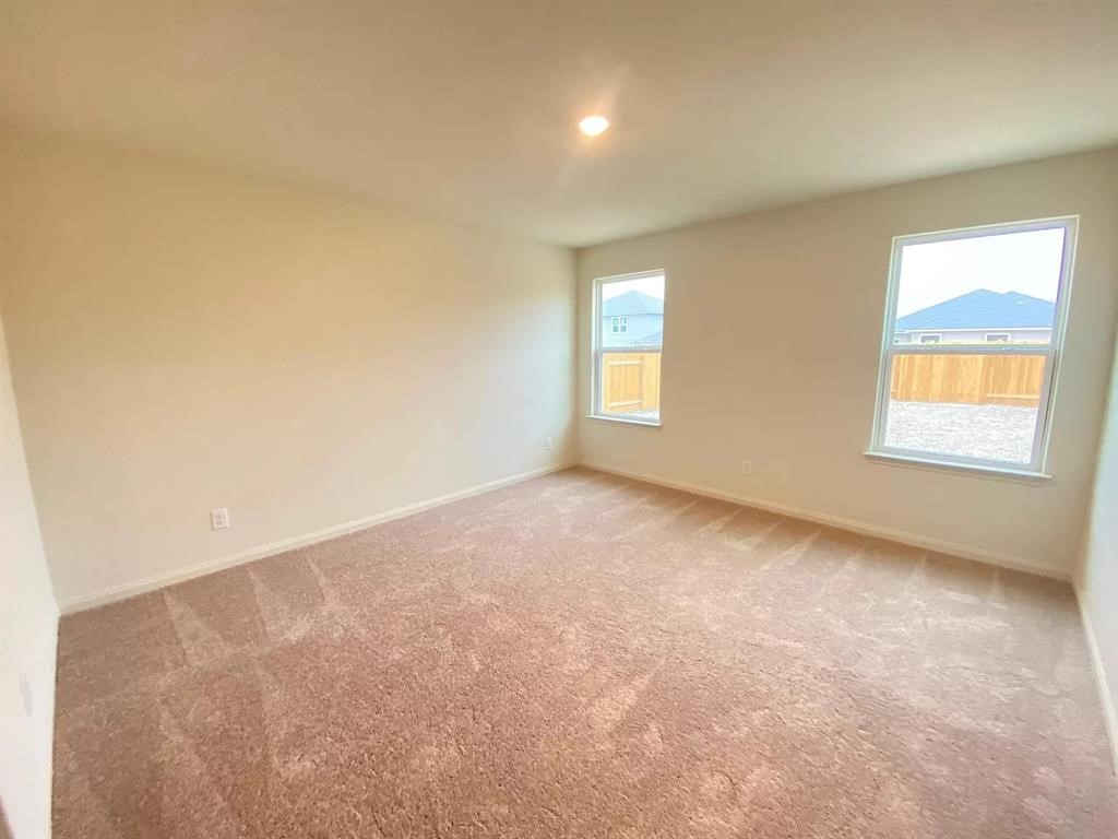 213 Allington Circle Jarrell, TX 76537 - Photo 4 of 16 a view of an empty room with a window