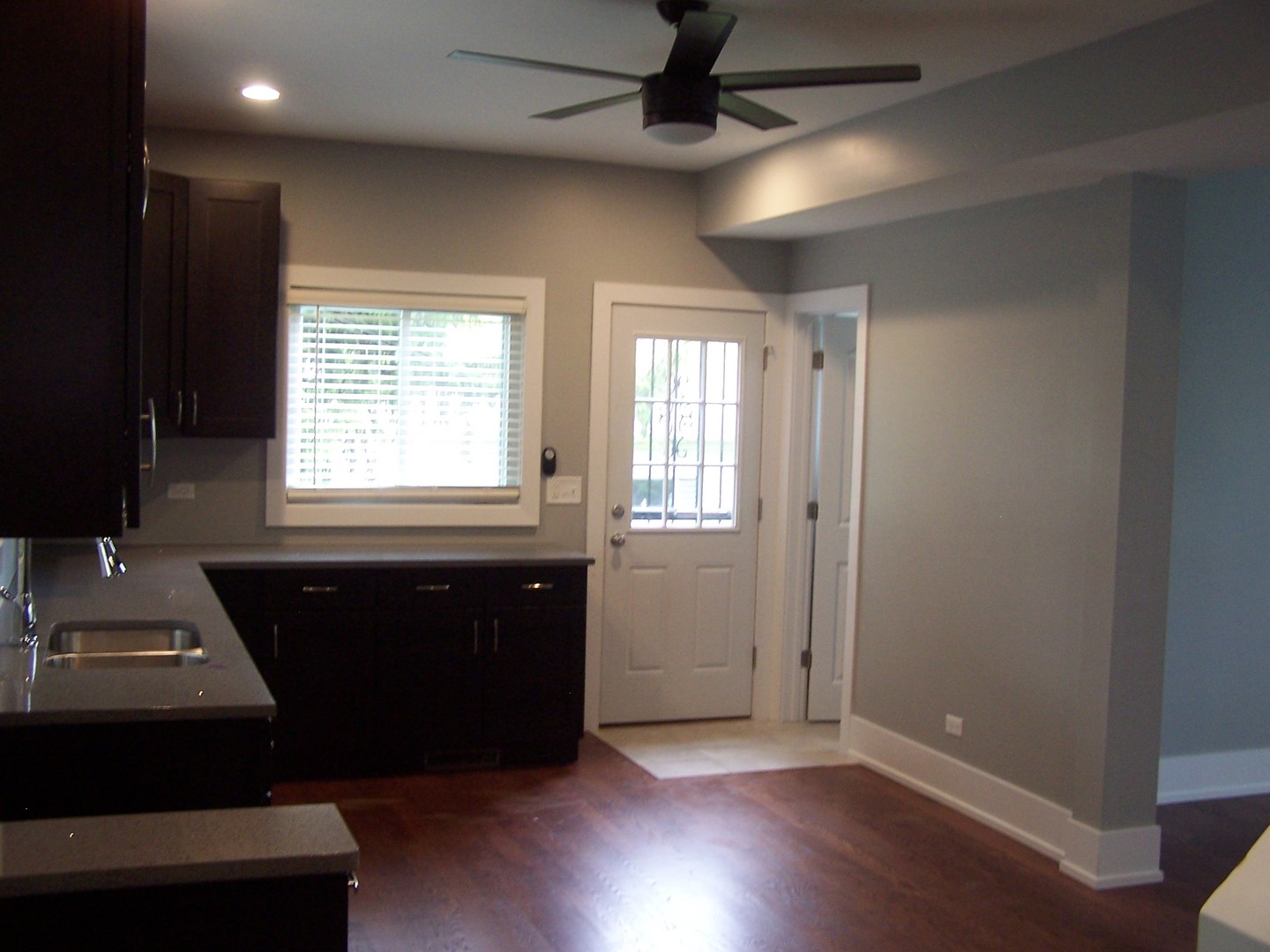 604 Clement Street Joliet, IL 60435 - Photo 3 of 17 a living room with furniture and a window