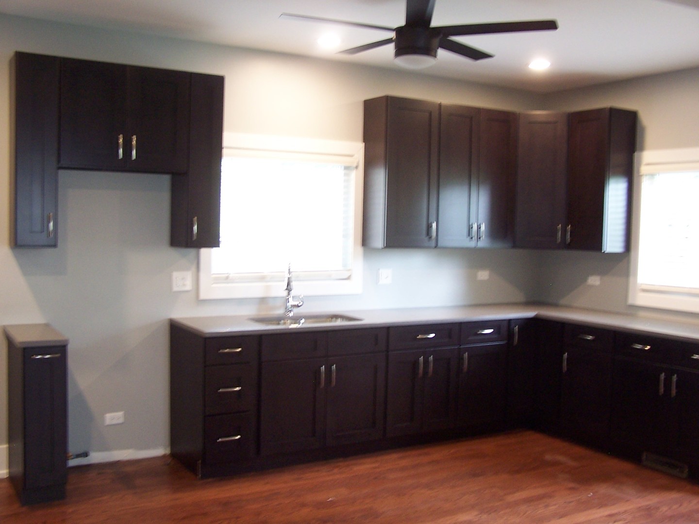 604 Clement Street Joliet, IL 60435 - Photo 4 of 17 a kitchen with a sink and cabinets