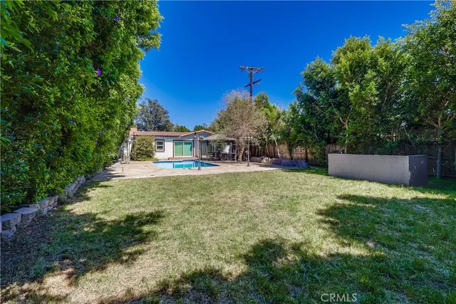 a house view with a garden space