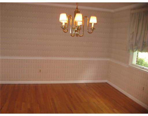 Dining Room. Formal dining room with gleaming hardwood floor