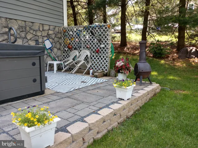 a view of yard with seating space