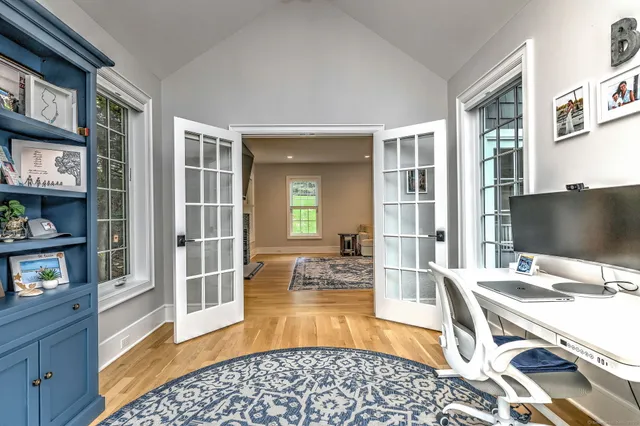 a lobby with furniture and rug