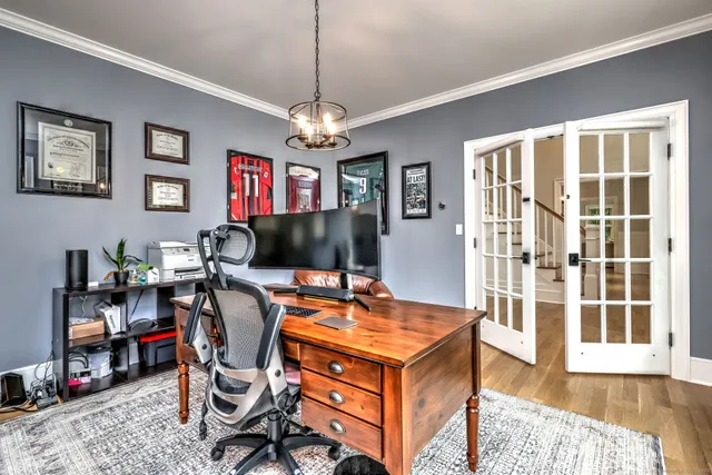 a view of a livingroom with furniture and window