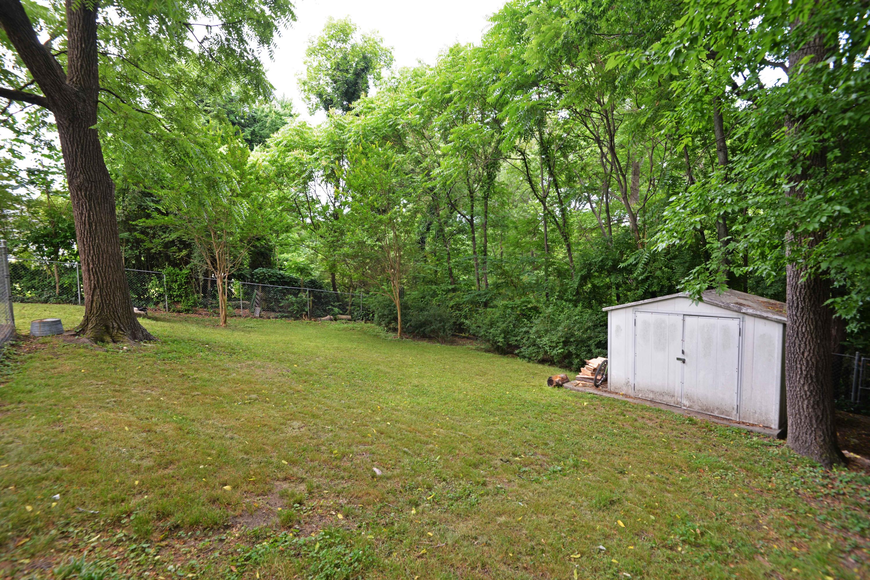 1113 South Crest Road Rossville, GA 30741 - Photo 24 of 28 Back yard and storage shed