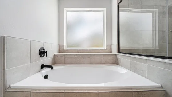 a bathroom with bathtub