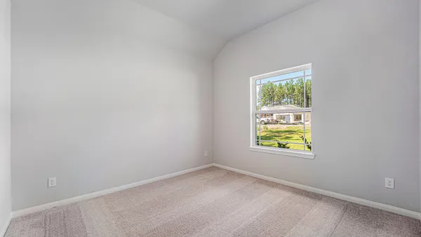 an empty room with window