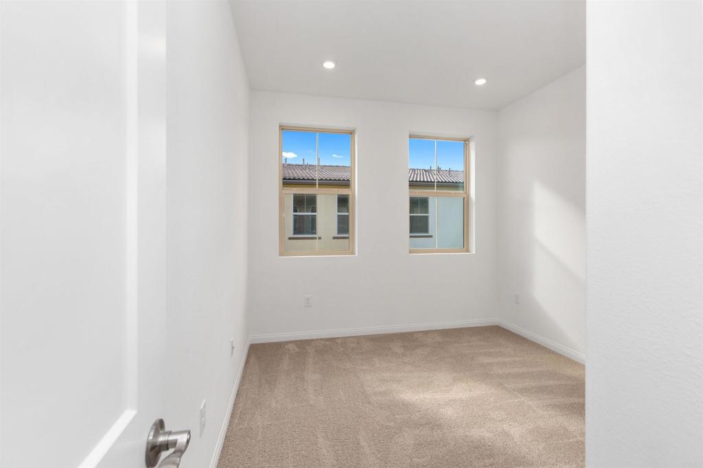 1532 Redbud Way Oceanside, CA 92056 - Photo 14 of 40 an empty room with windows