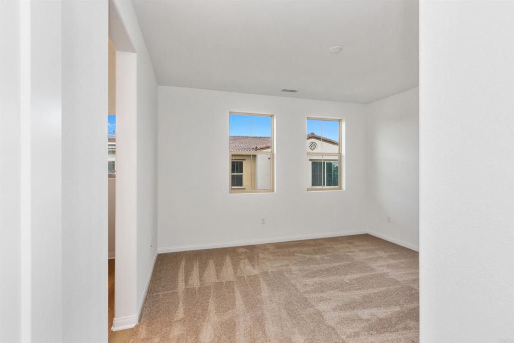 1532 Redbud Way Oceanside, CA 92056 - Photo 15 of 40 a view of an empty room with a window
