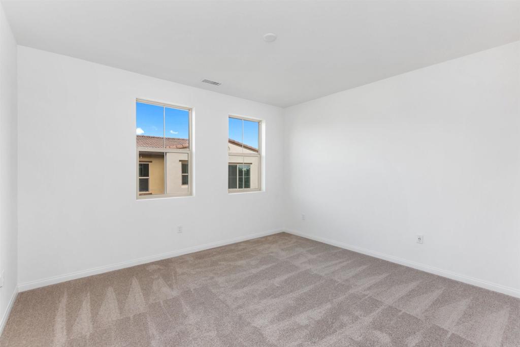 1532 Redbud Way Oceanside, CA 92056 - Photo 16 of 40 a view of an empty room with windows