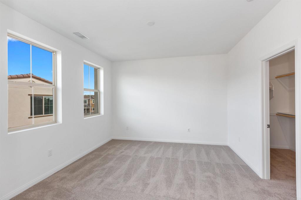 1532 Redbud Way Oceanside, CA 92056 - Photo 17 of 40 a view of an empty room with a window